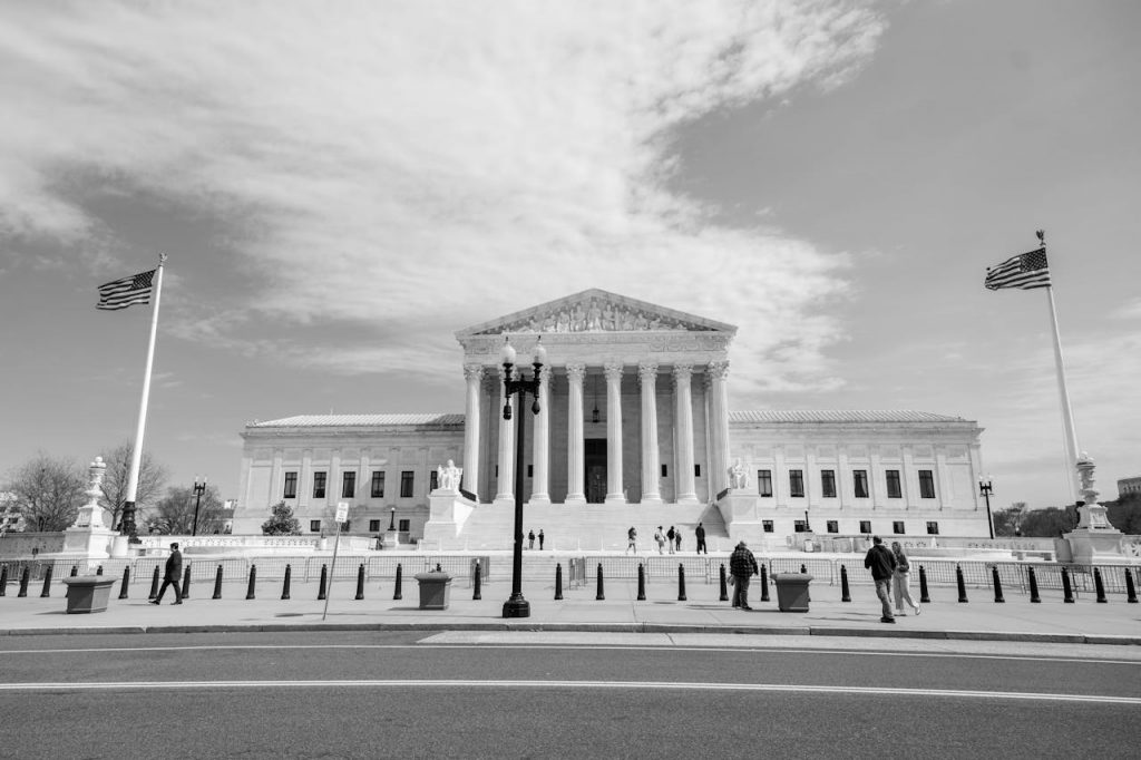 Classic view of the US Supreme Court building in Washington, D.C., highlighting neoclassical architecture.